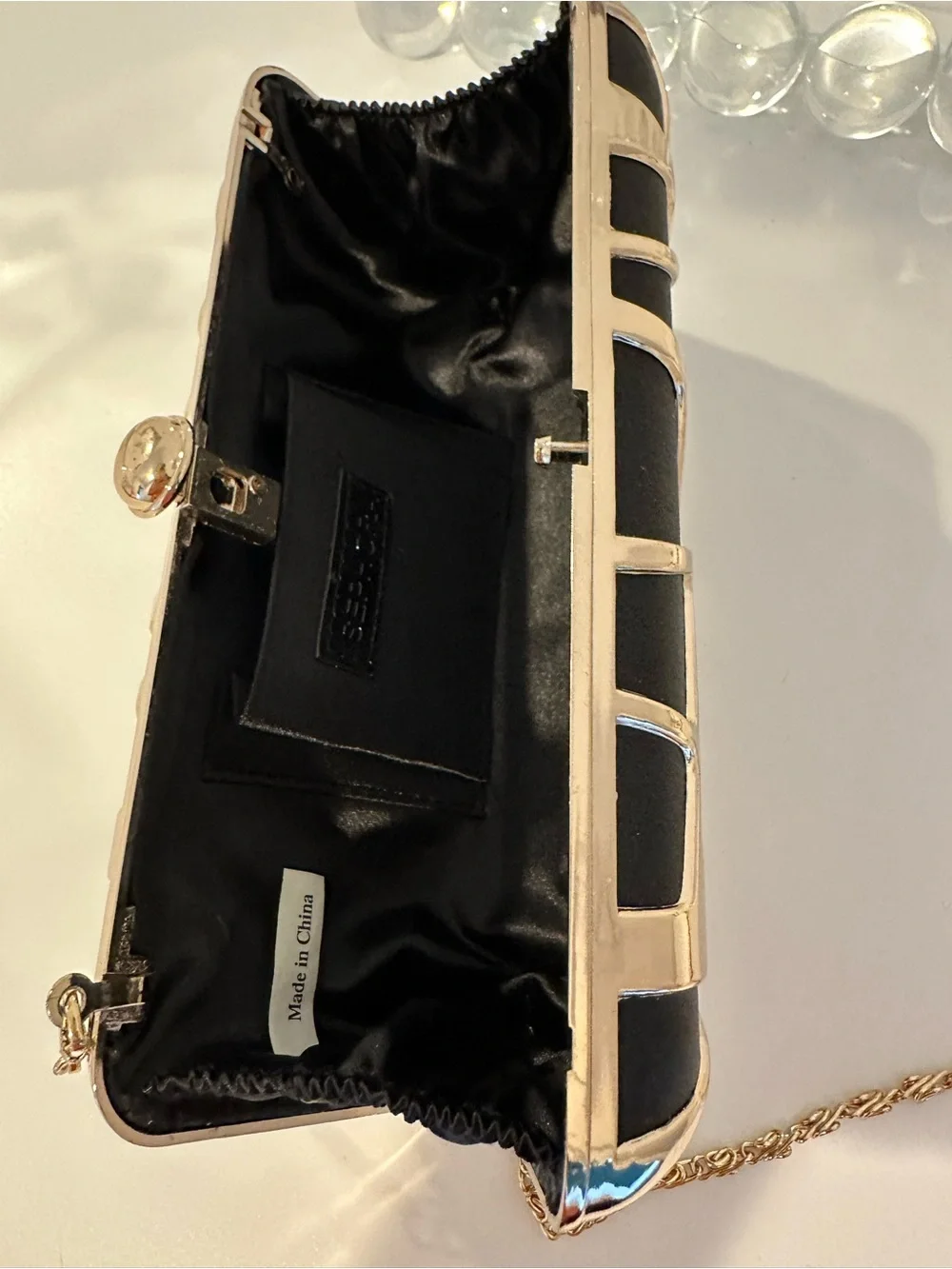 Black Geometric Metal-Trim Clutch with Chain